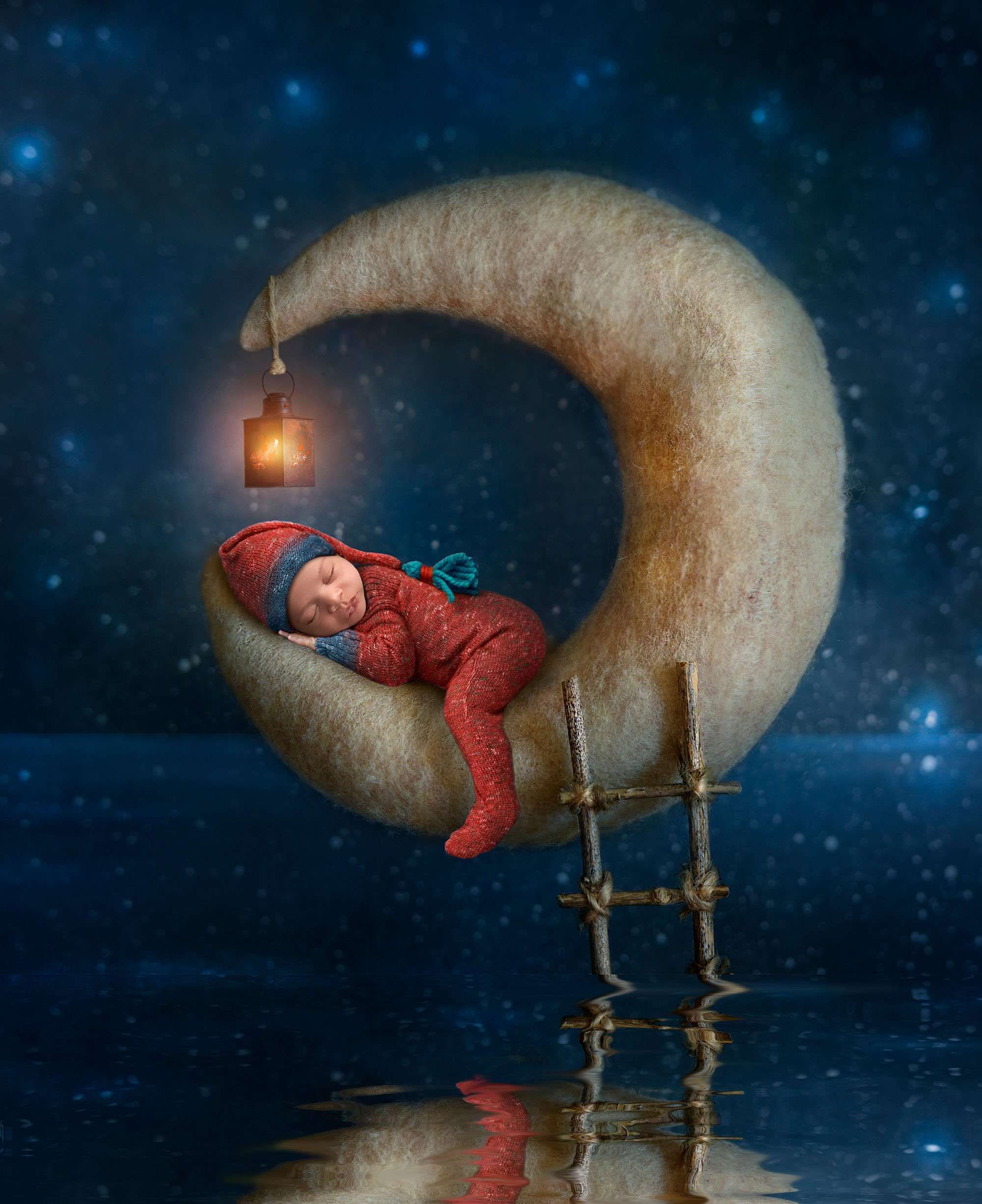 CT Newborn Photography newborn sleeping on the moon on a star filled night