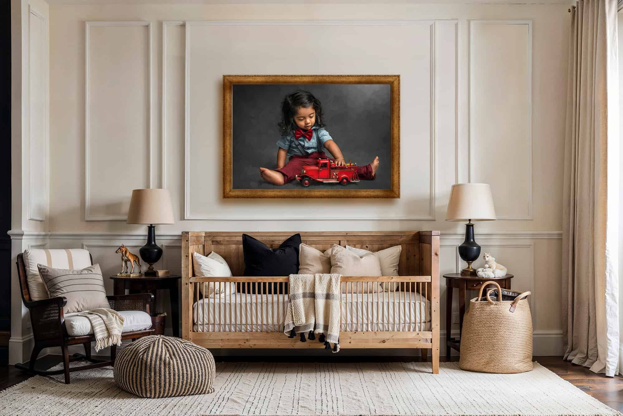 hand-painted canvas portrait framed on the wall of toddler boy playing with a firetruck