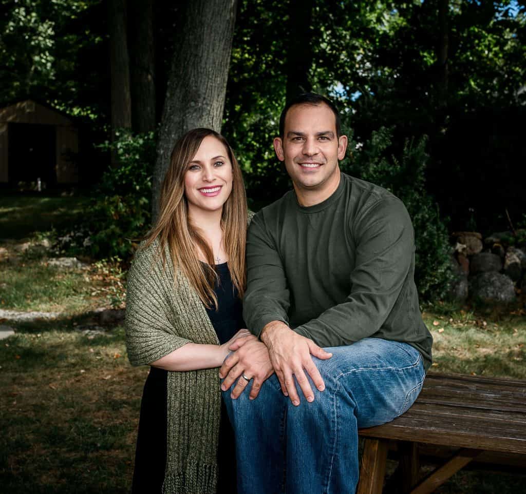 parents sitting in the garden smiling for a photograph One Big Happy Photo