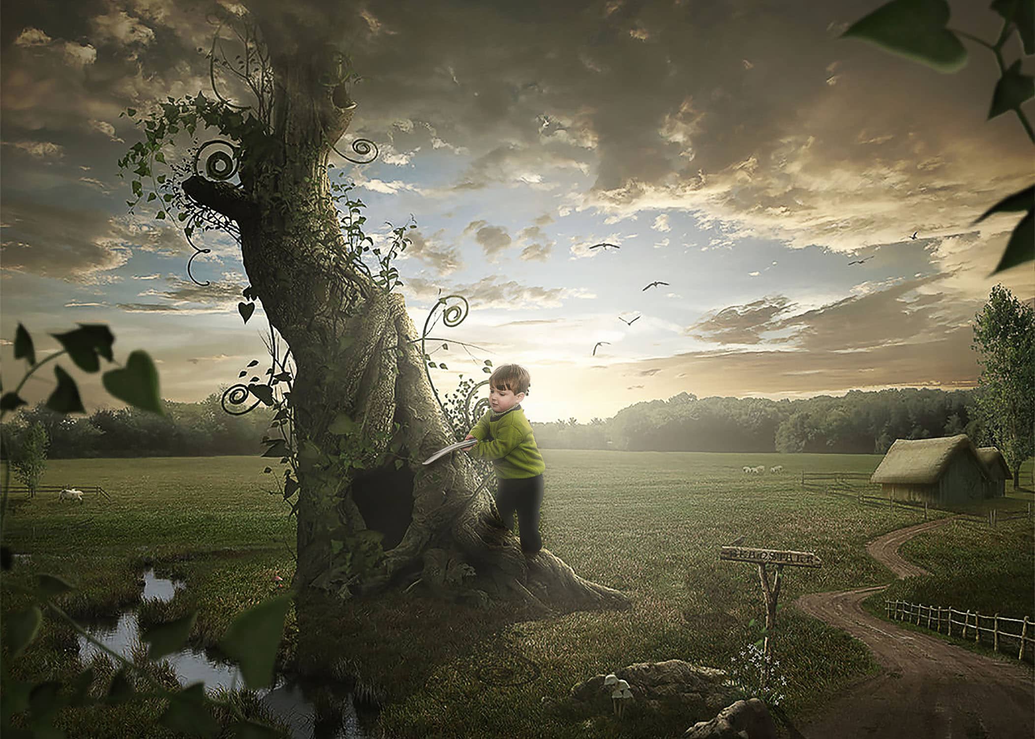 Toddler boy pretending to cut down a beanstalk