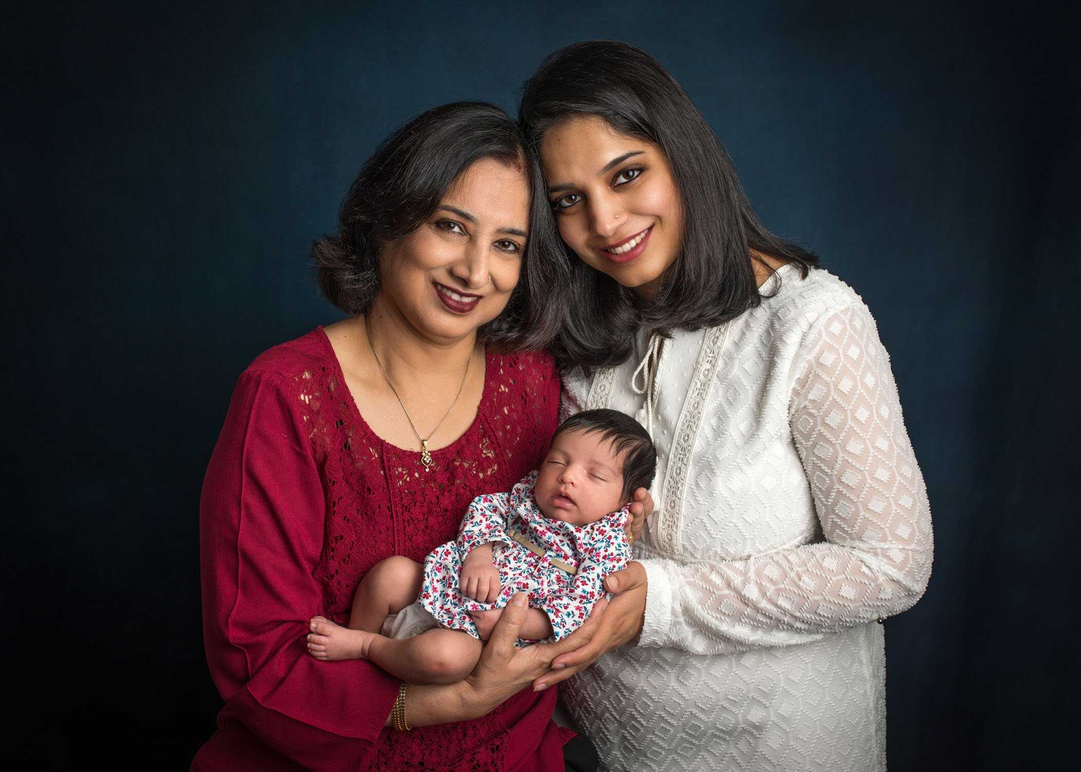 3 generations Grandma, Mom and newborn baby girl