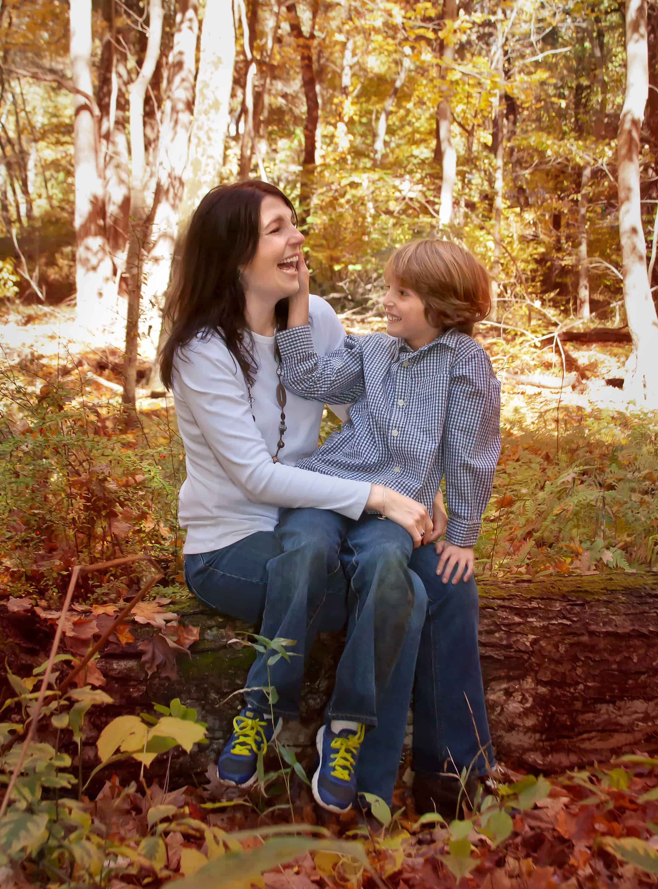 Mom and young son on her lap