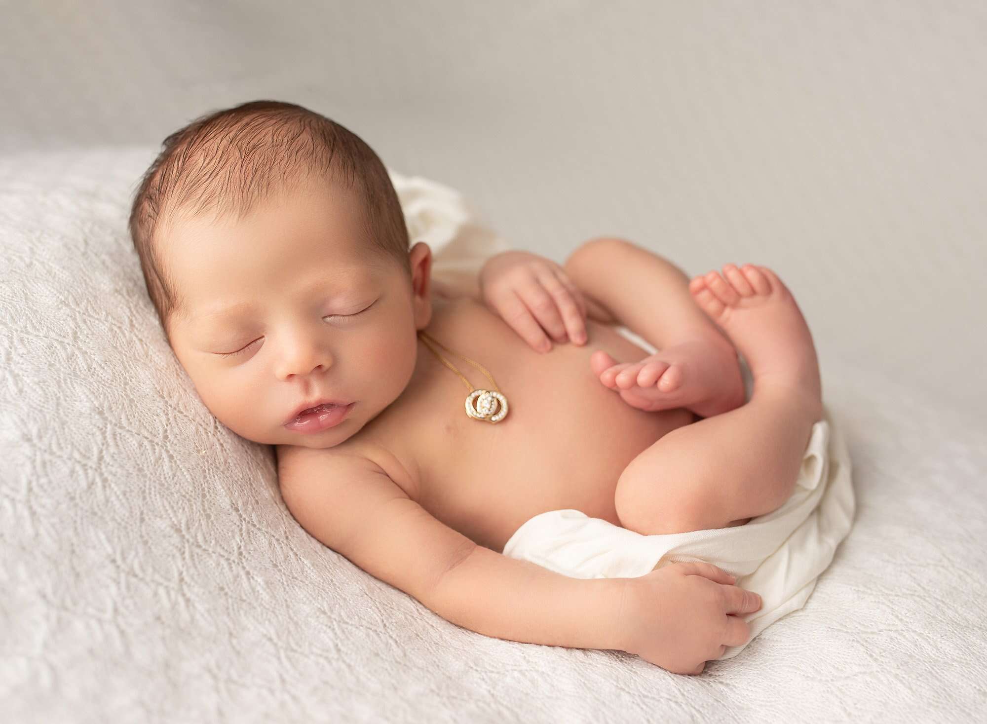 Light and Feminine Newborn Photos