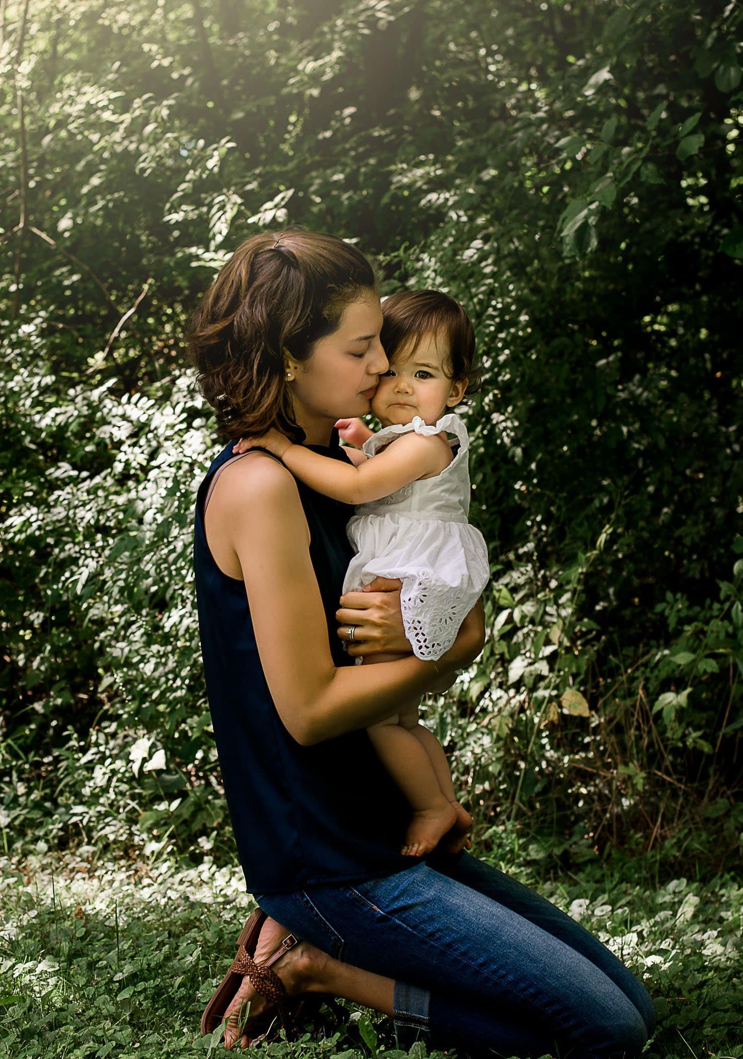 Momma comforting one year old baby girl photos One Big Happy Photo