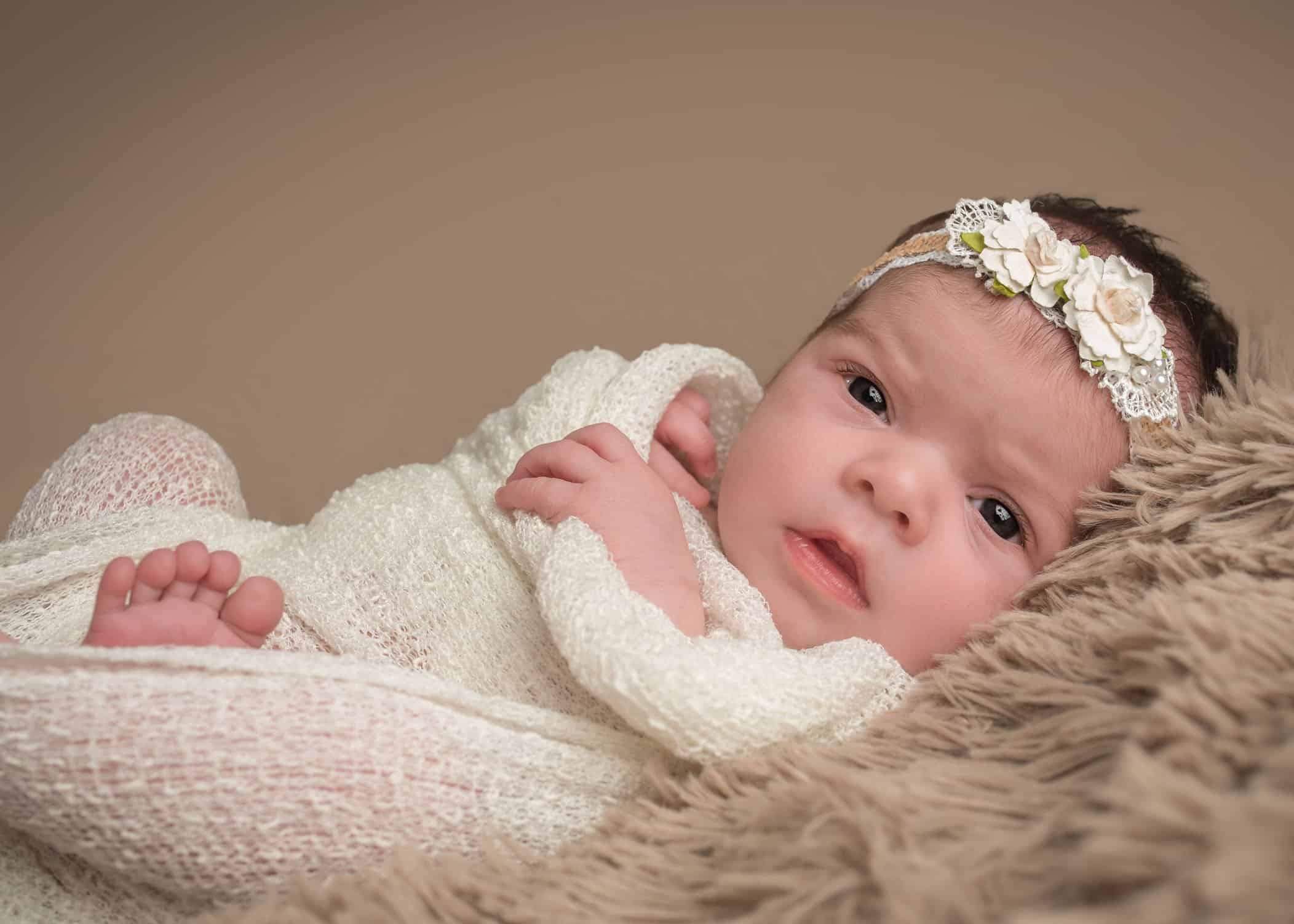 newborn baby girl eyes open