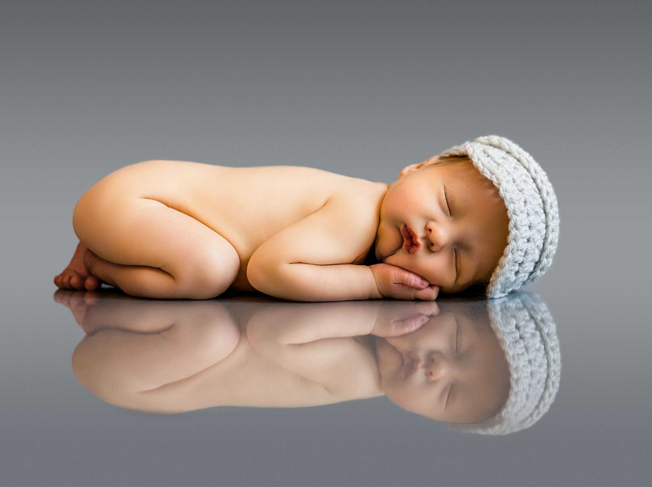Newborn baby reflection on grey background Glastonbury CT Newborn Photographer One Big Happy Photo www.onebighappyphoto.com/newborns