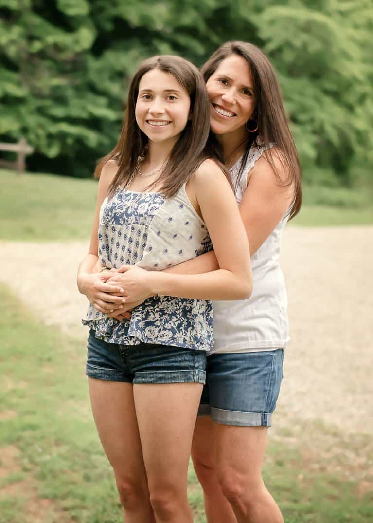 Mom and teen daughter outside in summertime