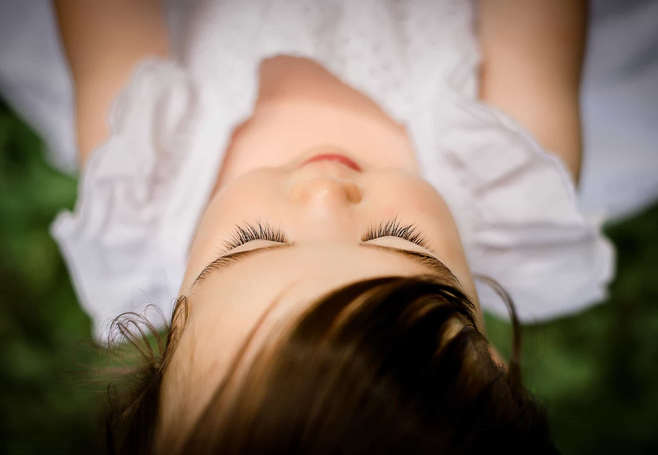 downward shot of baby girl's eyelashes One Big Happy Photo