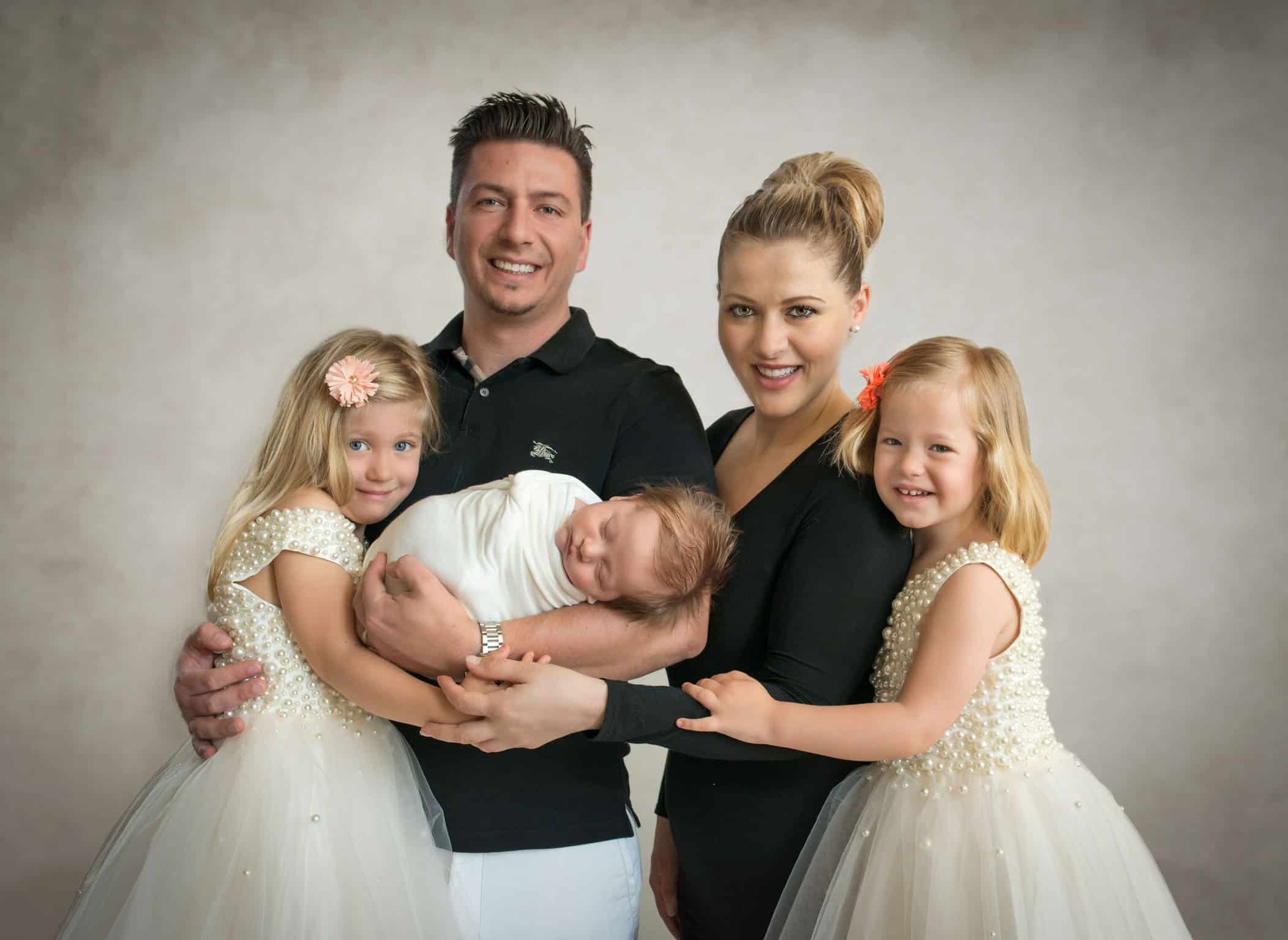 family of 5 with newborn son in arms