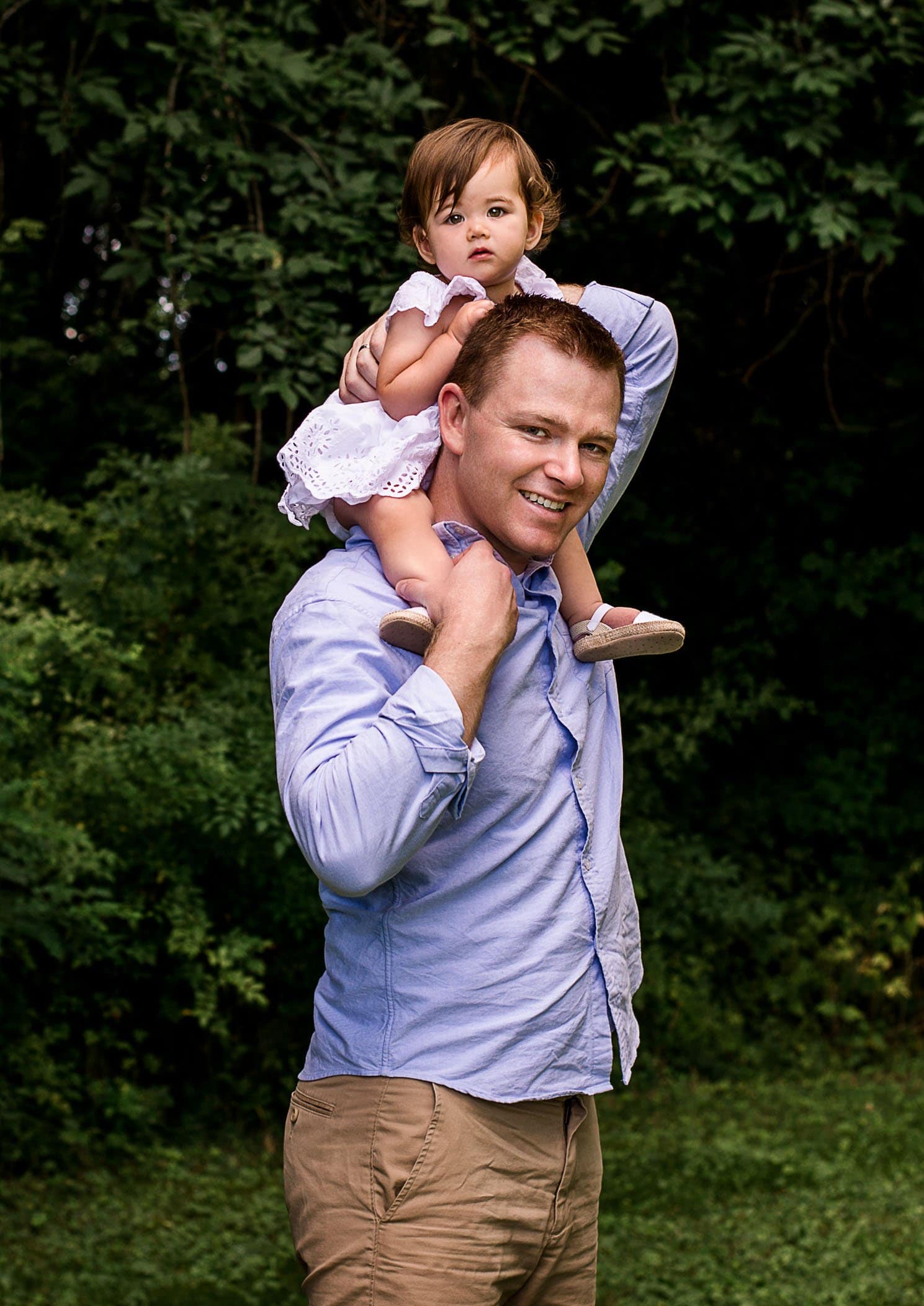 one year old baby girl photograph sitting on Daddy's shoulders One Big Happy Photo